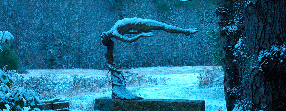 Innocence in the winter at River Studio Bronze sculpture by Andrew DeVries